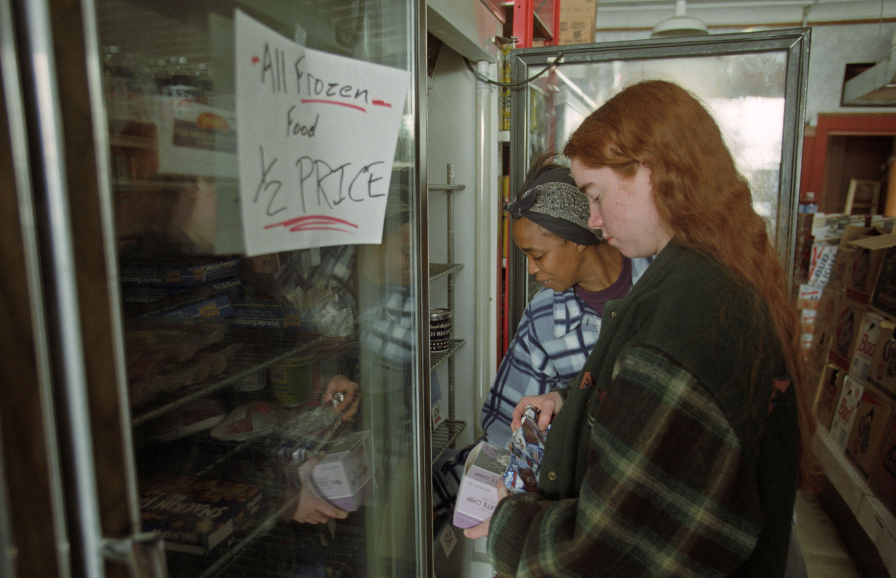 Bob Fields, owner of Mike's Grocery at 40th and California Streets put his frozen foods on sale and gave away free ice cream with any purchase.